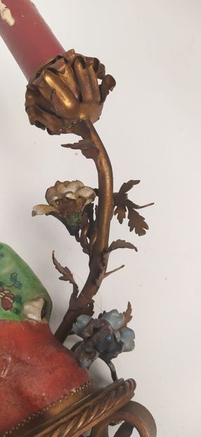 Pair of sconces in metal with subject in...