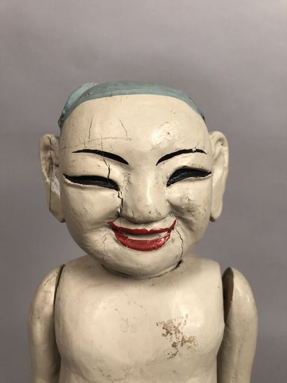 Japon, XXe
Figurine aux bras articulés en...