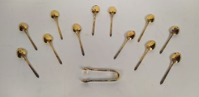 12 mocha spoons and sugar tongs in silver...