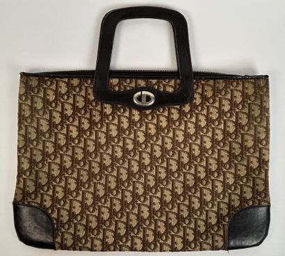 CHRISTIAN DIOR
Handbag in signed canvas and...