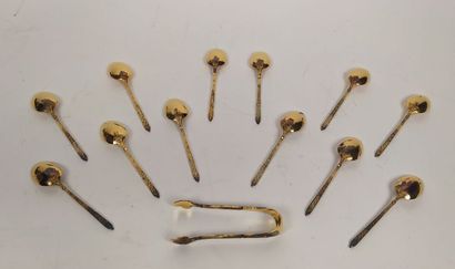 12 mocha spoons and sugar tongs in silver...