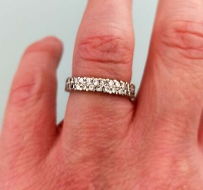 American wedding band in grey set with diamonds
Gross...