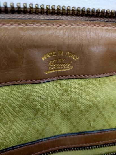 GUCCI
Brown leather travel bag
Height: 36...