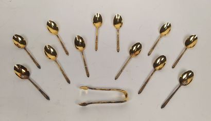 12 mocha spoons and sugar tongs in silver...