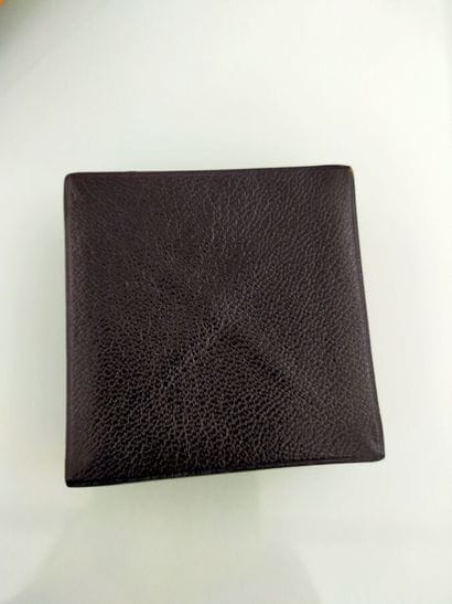 HERMES
Yellow and black leather Zulu folding...