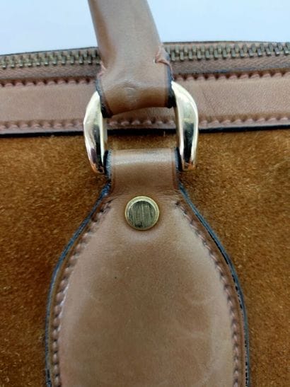GUCCI
Brown leather travel bag
Height: 36...