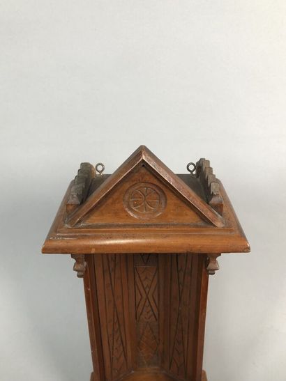 Niche in carved and molded cherry wood. Pediment...