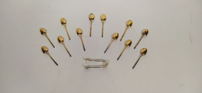 12 mocha spoons and sugar tongs in silver...