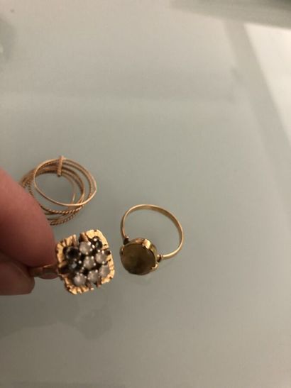 Yellow gold ring paved with nine white stones...
