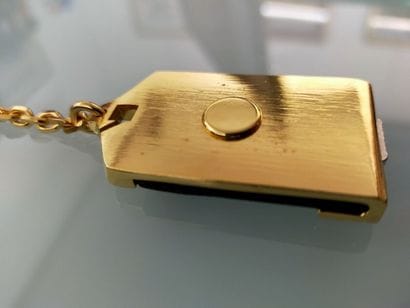 CHRISTIAN DIOR
Key ring in gilded metal and...