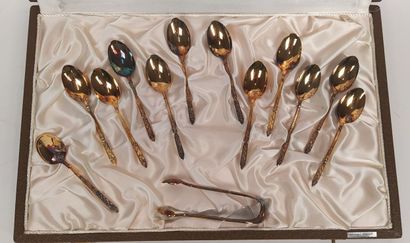 12 mocha spoons and sugar tongs in silver...