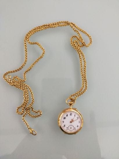 Neck watch and its chain in 18k yellow gold
Gross...