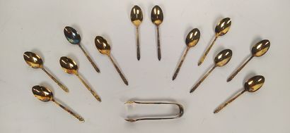 12 mocha spoons and sugar tongs in silver...