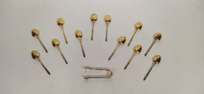 12 mocha spoons and sugar tongs in silver...