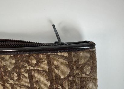 CHRISTIAN DIOR
Handbag in signed canvas and...
