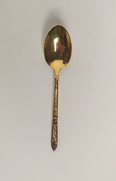 12 mocha spoons and sugar tongs in silver...