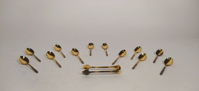 12 mocha spoons and sugar tongs in silver...