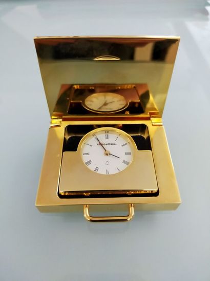 LANCEL
Travelling clock in gilded metal
Height...