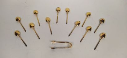 12 mocha spoons and sugar tongs in silver...