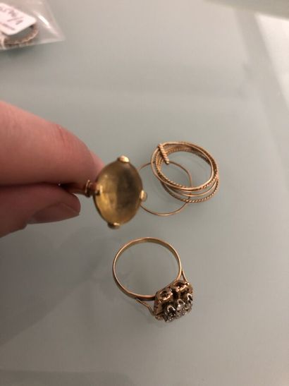 Yellow gold ring paved with nine white stones...