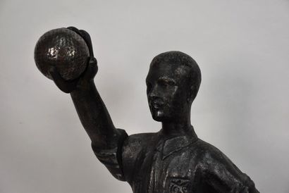 BOWL GAMES 
English bowls player.
Sculpture...