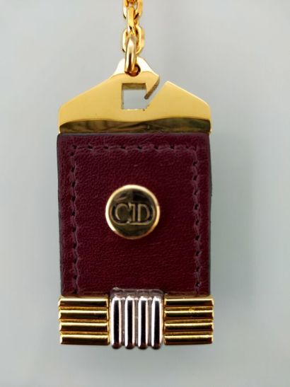 CHRISTIAN DIOR
Key ring in gilded metal and...