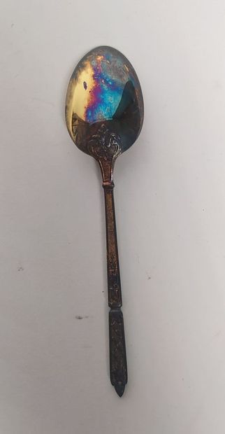 12 mocha spoons and sugar tongs in silver...