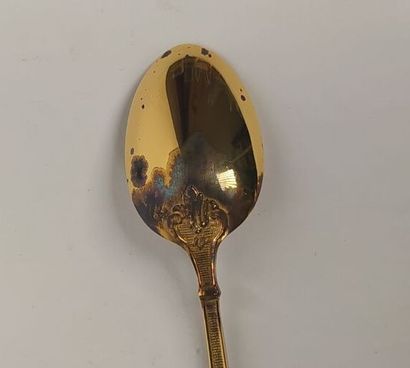 12 mocha spoons and sugar tongs in silver...