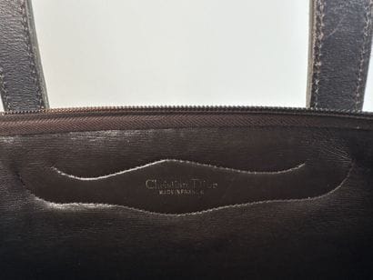 CHRISTIAN DIOR
Handbag in signed canvas and...