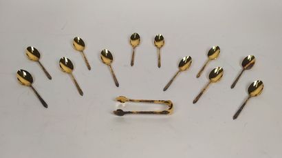 12 mocha spoons and sugar tongs in silver...
