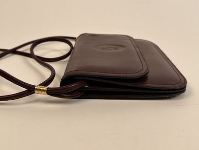 CARTIER -
Shoulder bag in burgundy leather,...