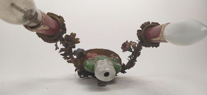 Pair of sconces in metal with subject in...