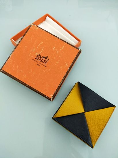 HERMES
Yellow and black leather Zulu folding...