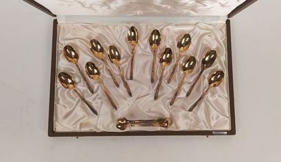 12 mocha spoons and sugar tongs in silver...