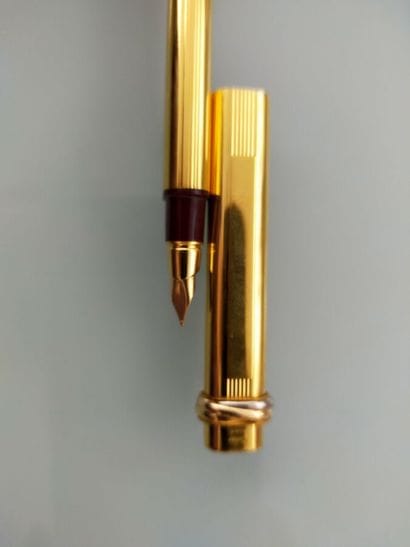 CARTIER Paris
Gilded metal fountain pen with...