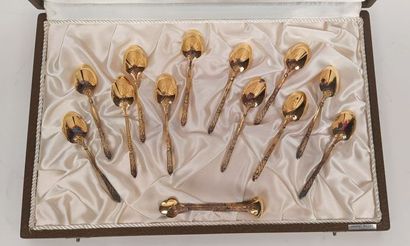 12 mocha spoons and sugar tongs in silver...