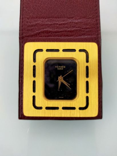 HERMES
Rectangular metal quartz travel alarm...