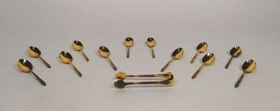 12 mocha spoons and sugar tongs in silver...
