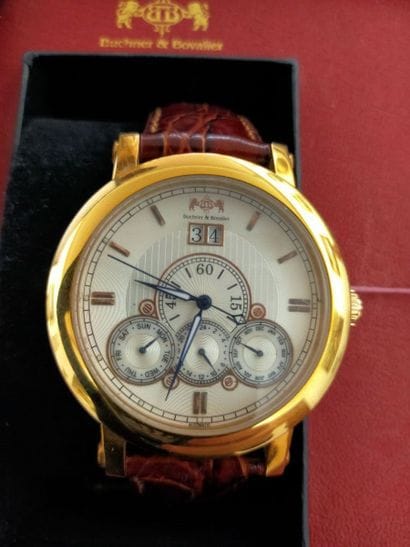 BUCHNER BOVALIER
Round men's watch made of...
