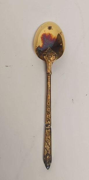 12 mocha spoons and sugar tongs in silver...