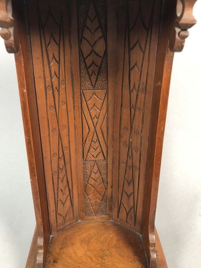 Niche in carved and molded cherry wood. Pediment...