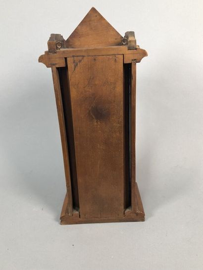 Niche in carved and molded cherry wood. Pediment...