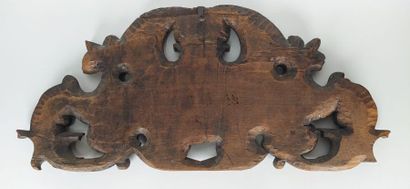 Sculpture on wood with cherub in bas-relief....