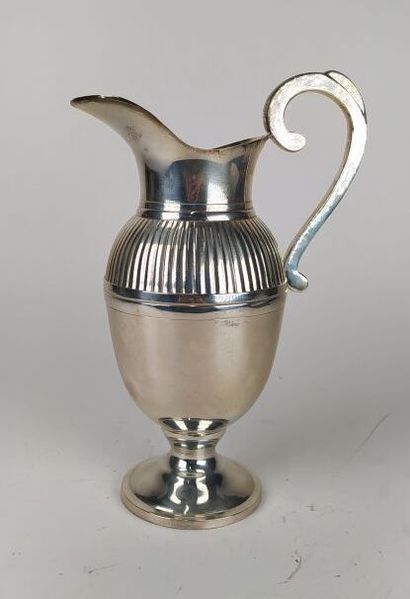 A silver-plated metal pourer
Height : 28...
