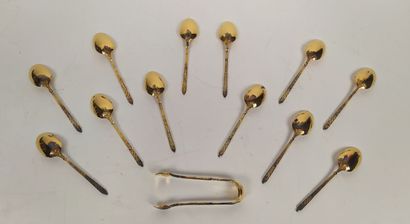 12 mocha spoons and sugar tongs in silver...