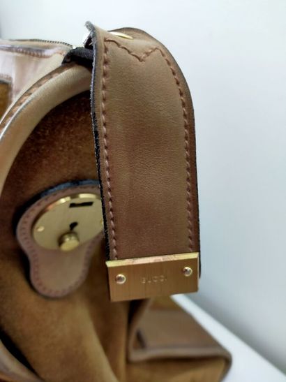 GUCCI
Brown leather travel bag
Height: 36...