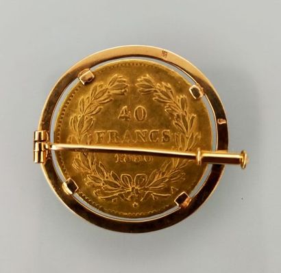 Brooch in 18K yellow gold set with a 40 francs...