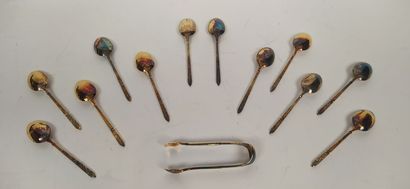 12 mocha spoons and sugar tongs in silver...