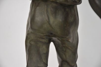 BALL GAMES. 
English bowls player.
Sculpture...