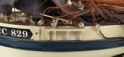 Antique model of a boat in a suitcase 
Height...